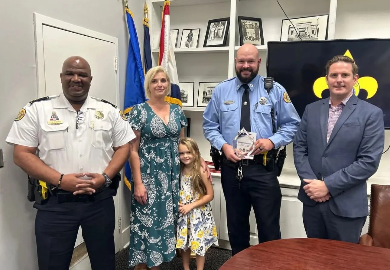 officer-of-the-month group photo with the officer of the month